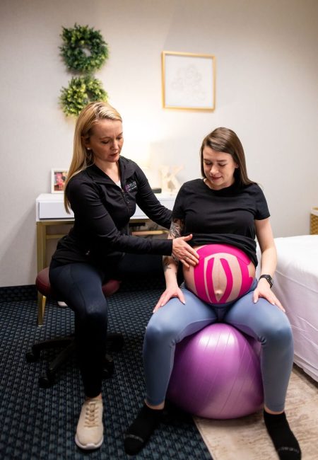 Dr. Katie treating a patient and providing Prenatal Physical Therapy services at Taylor Physical Therapy and Wellness